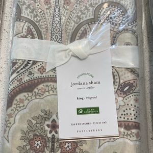 Pottery barn king duvet and shams.